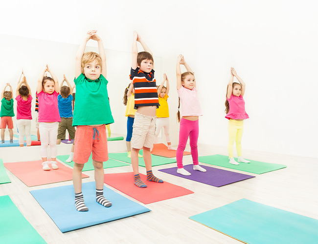 5 year olds participating in a movement class.